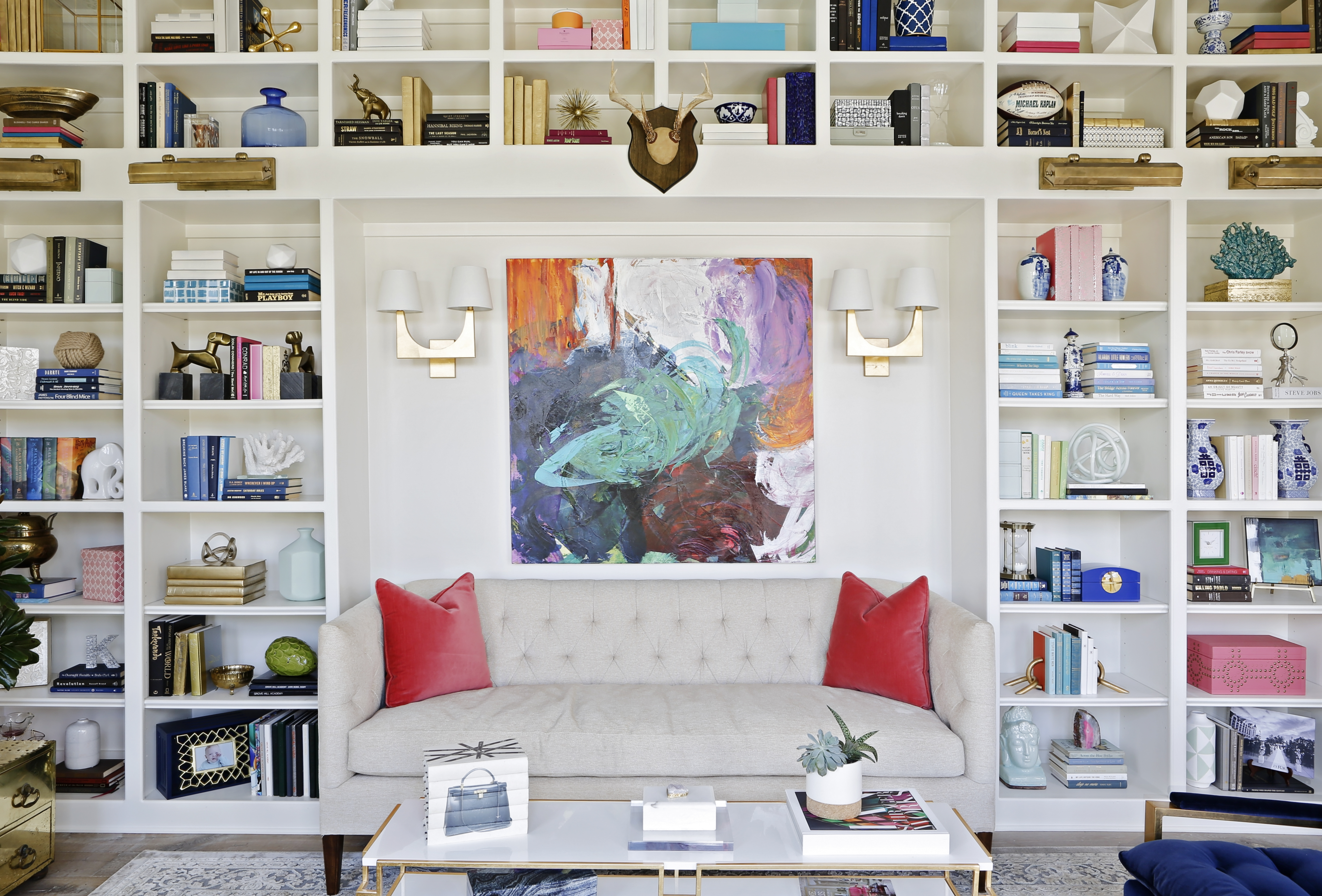 living room interior with many bookcases