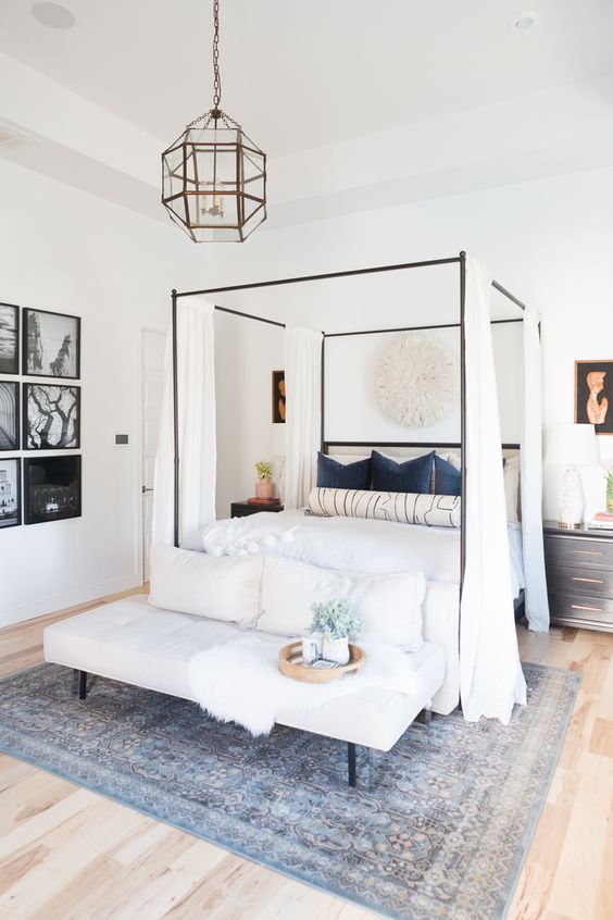 modern chic room with canopy bed