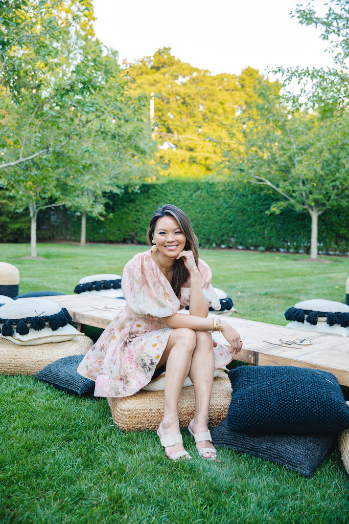 woman sitting on lawn