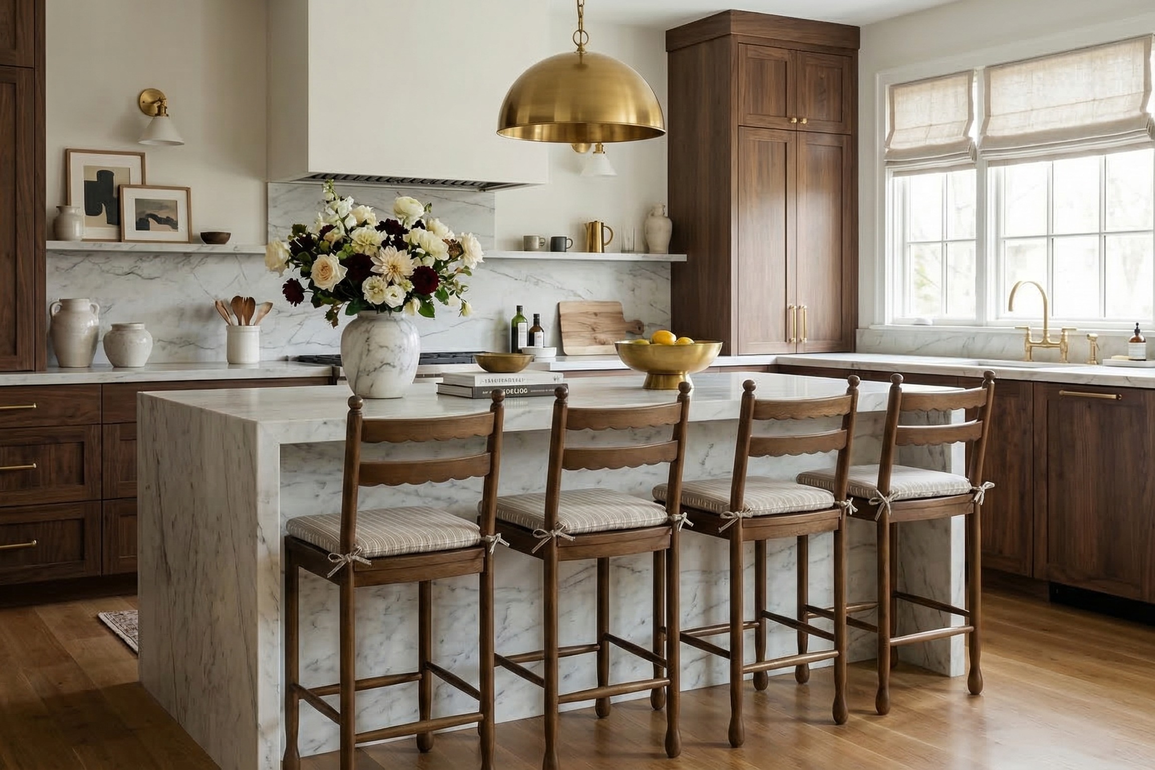 Declan counter stools in kitchen with walnut brown cabinetry and marble countertop