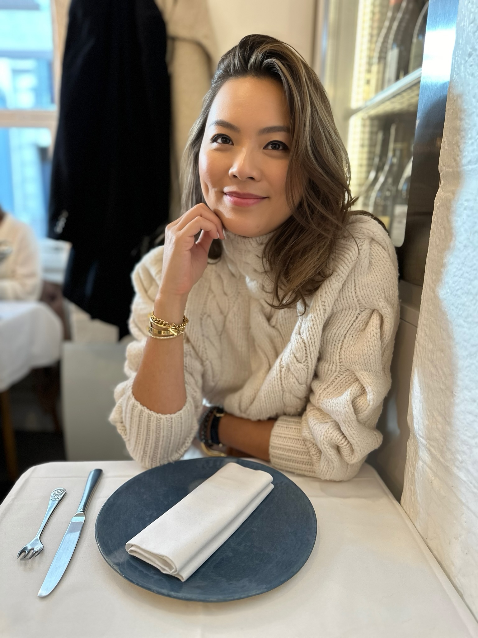 woman in white sweater