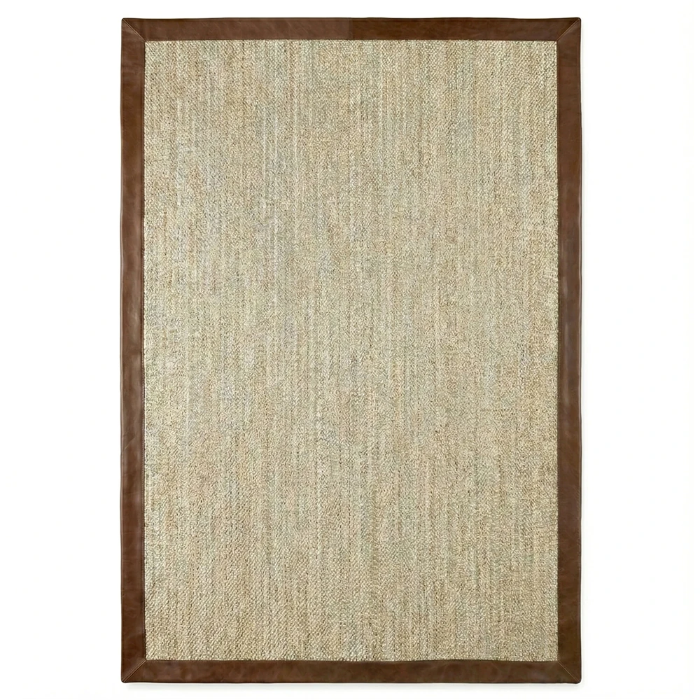 Fibreworks braided jute rug with leather trim