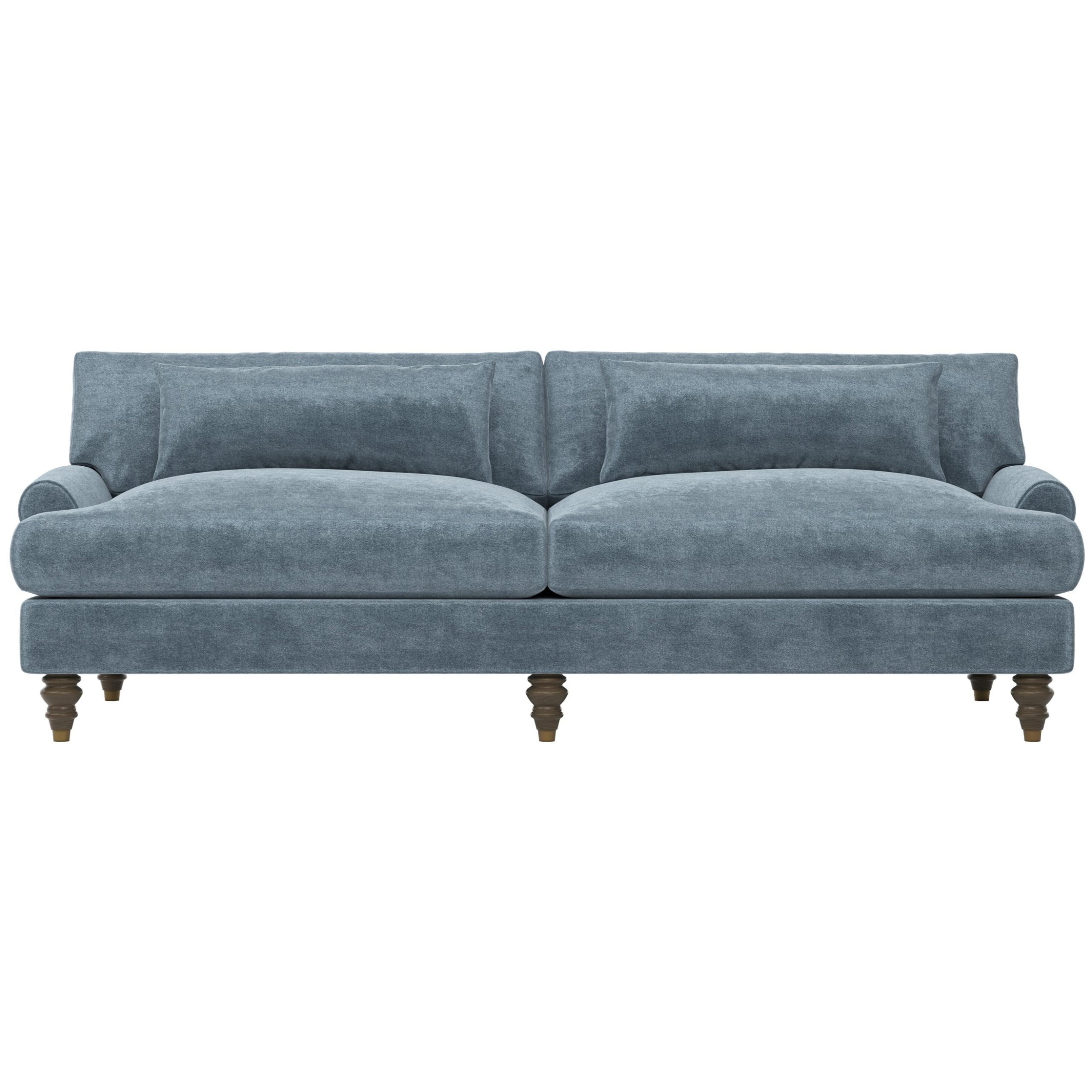 Blue velvet sofa with turned wood legs