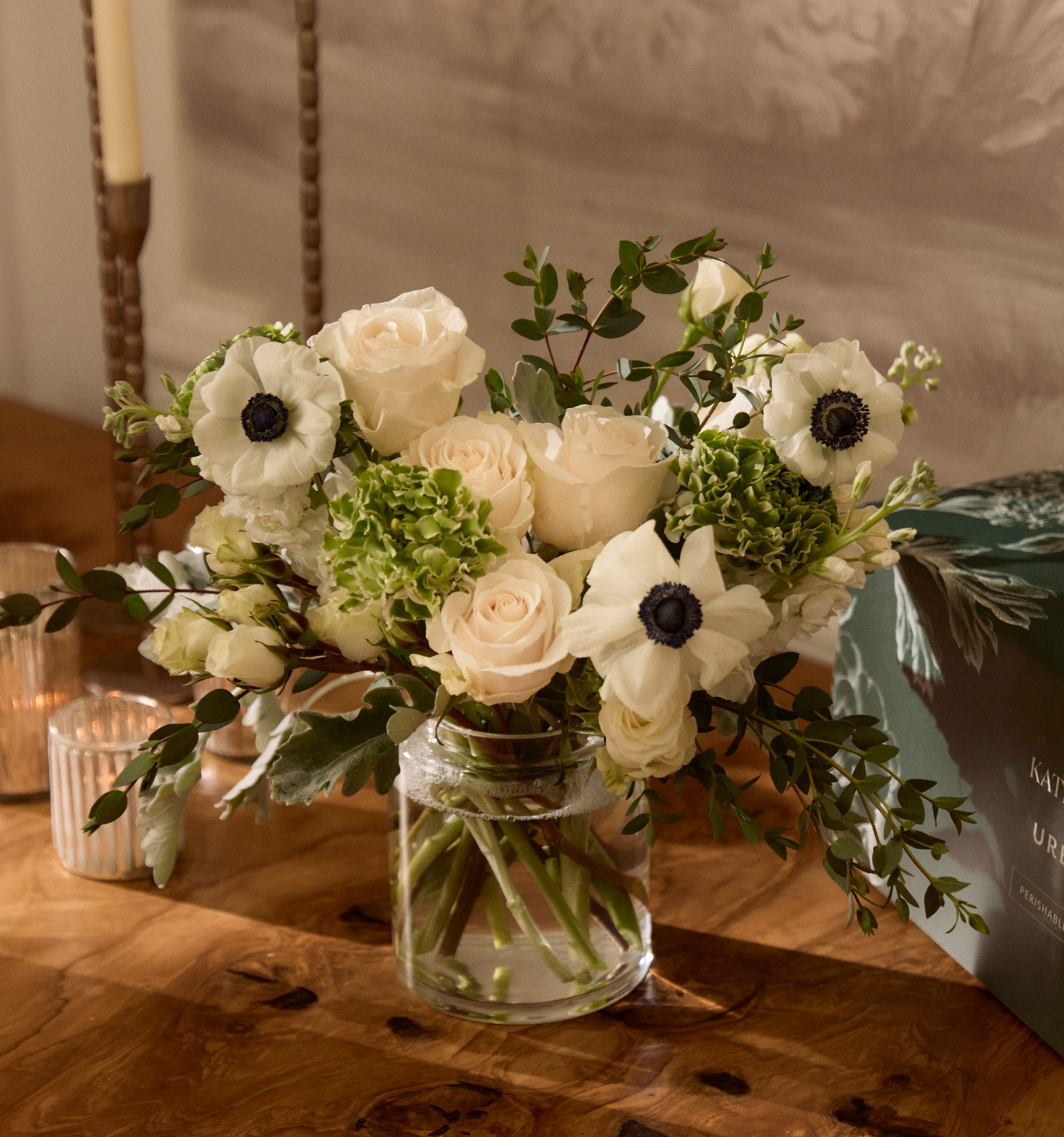 A Kathy Kuo Home x UrbanStems floral bouquet with garden roses, pon pon ranunculus, and anemone
