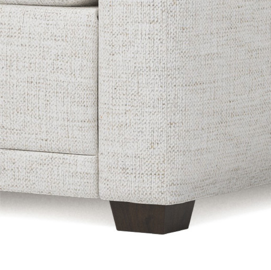 tapered wood block leg on sofa