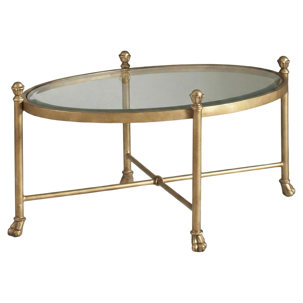 oval antique gold cocktail table with claw feet