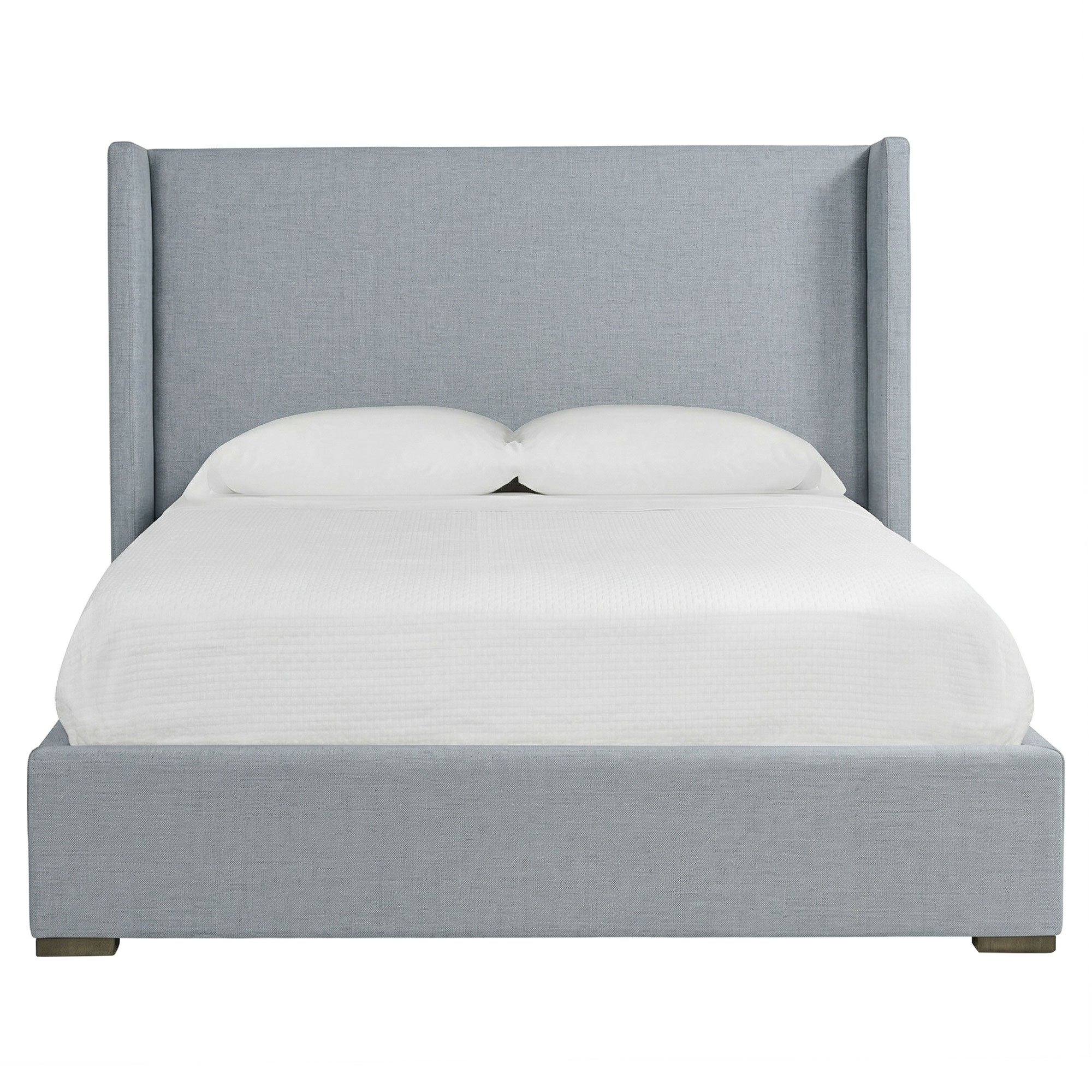 queen bed upholstered in Sunbrella Performance slub weave blue haze