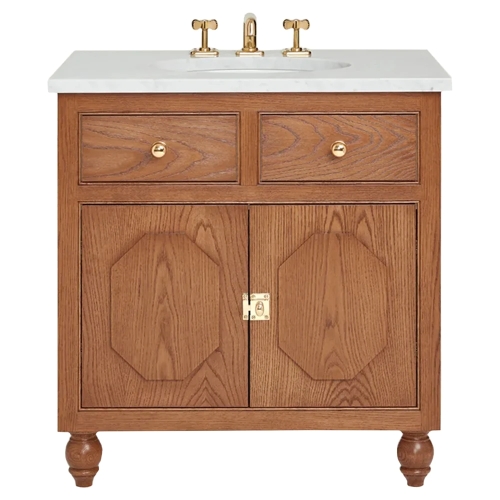 brown wood vanity cabinet with a marble countertop and brass hardware