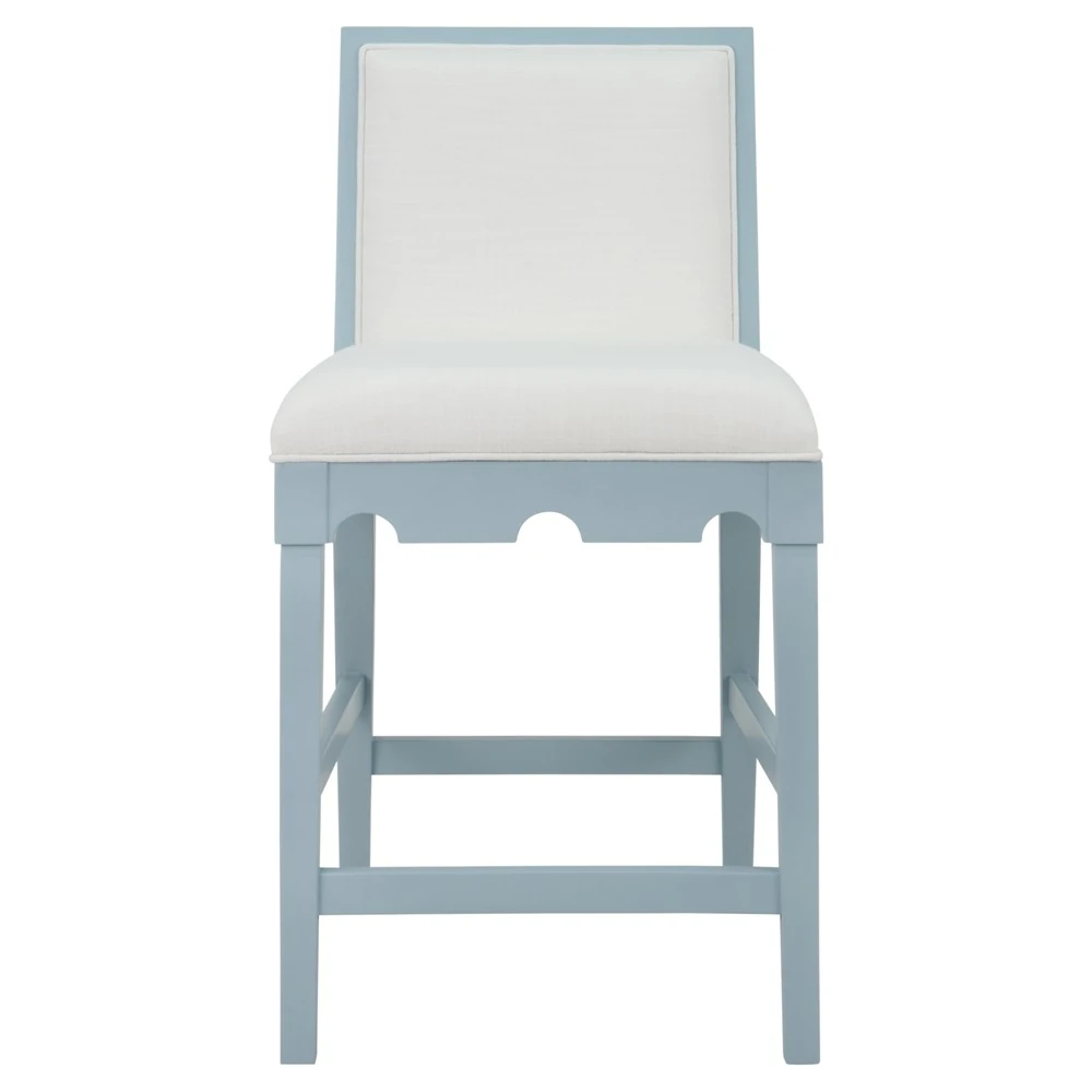 blue wood counter stool with white upholstered seat and back