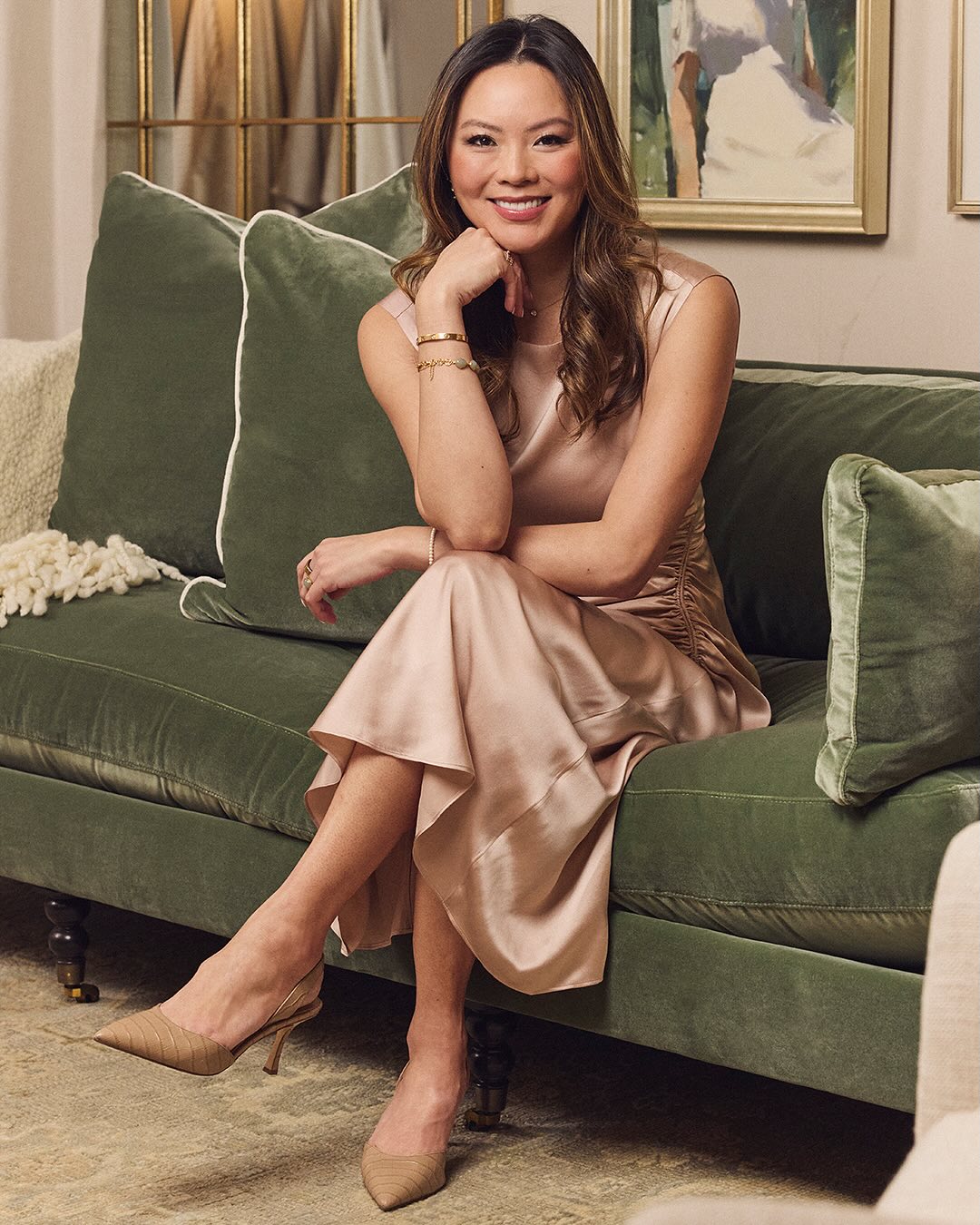 woman on green sofa