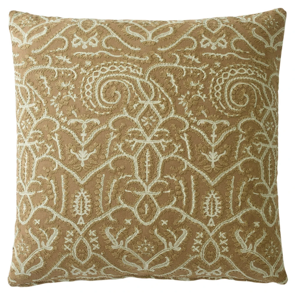 brown and cream embroidered throw pillow