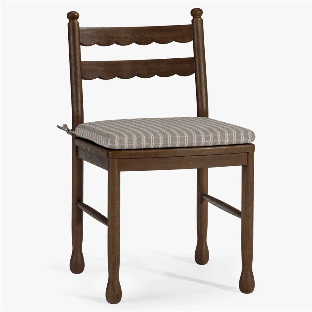 brown scalloped dining chair with striped seat cushion
