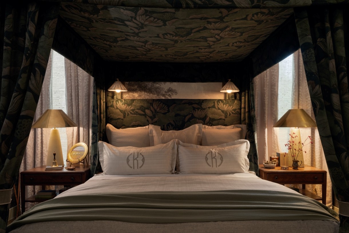 Canopy bed with green velvet canopy and curtains