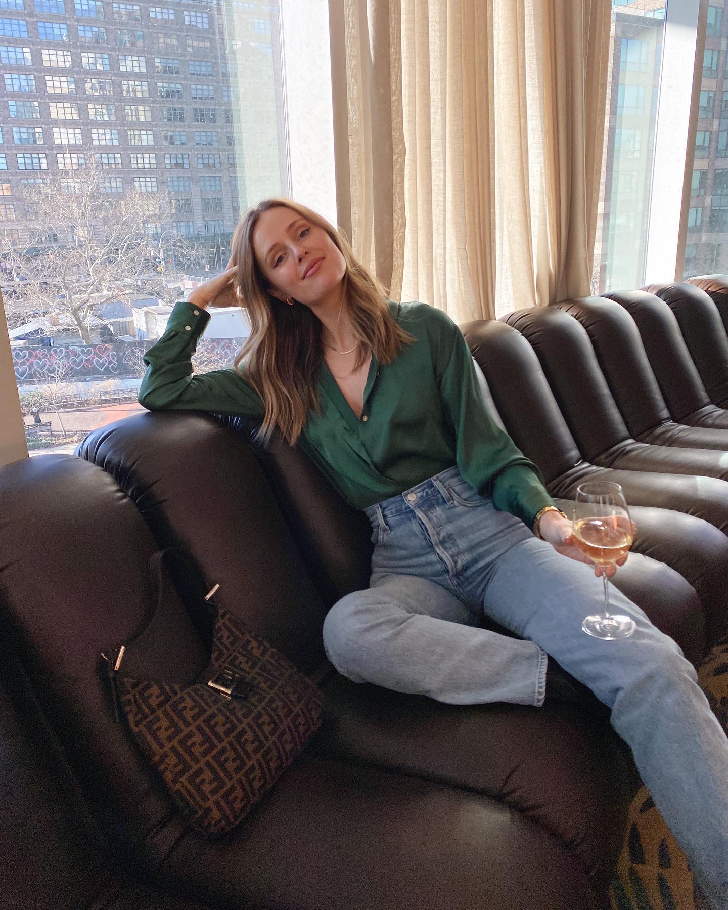 woman holding wine glass