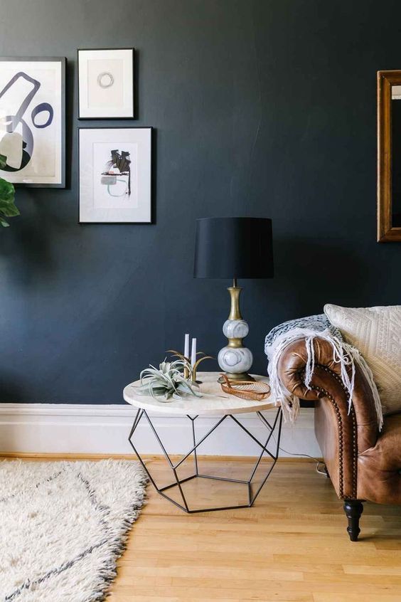 living room with navy blue walls
