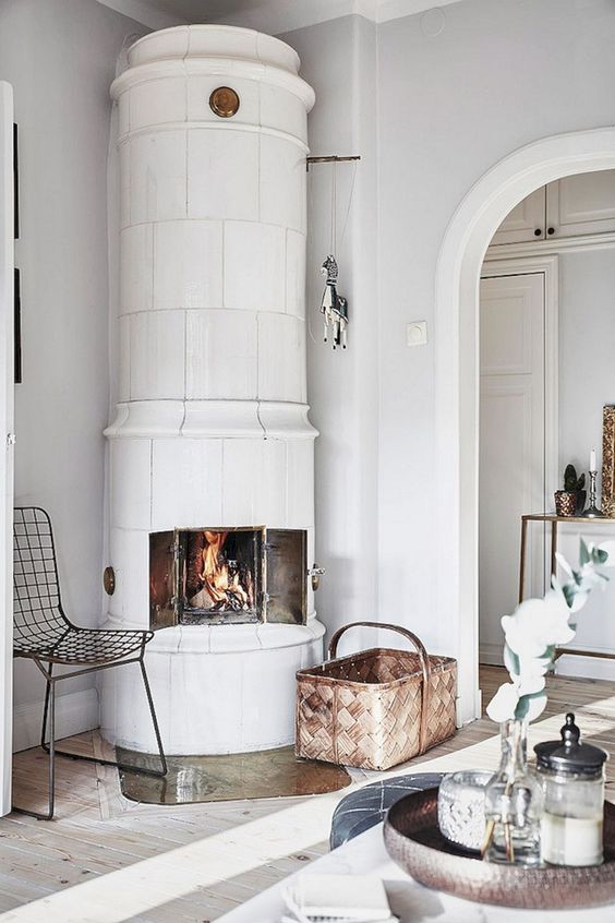 living room in all white with fireplace