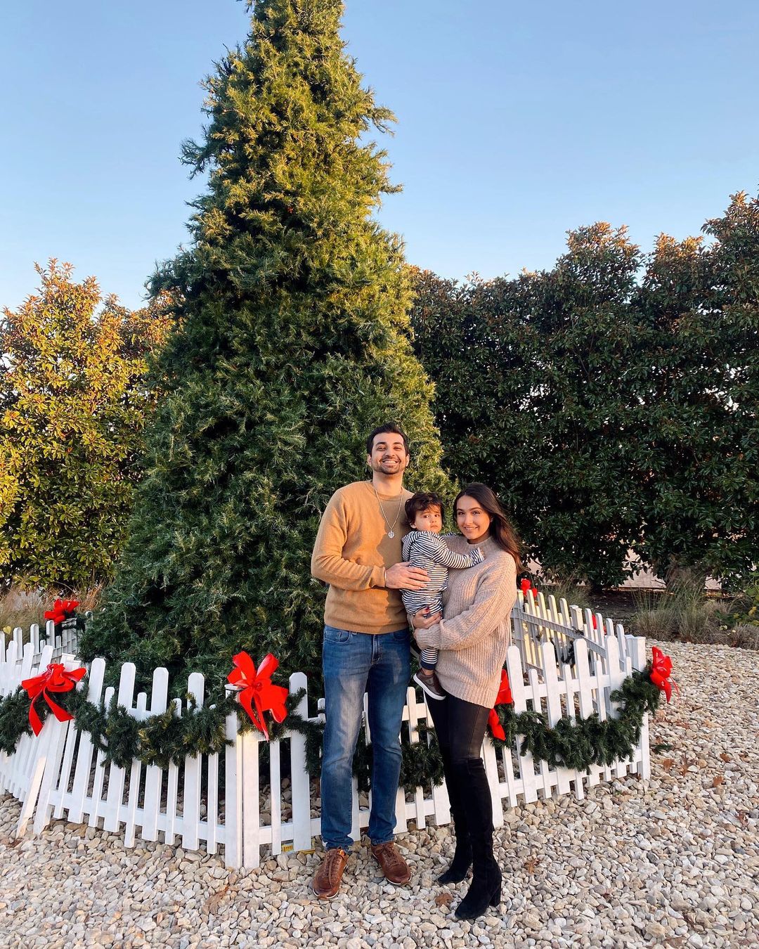 family with christmas tree