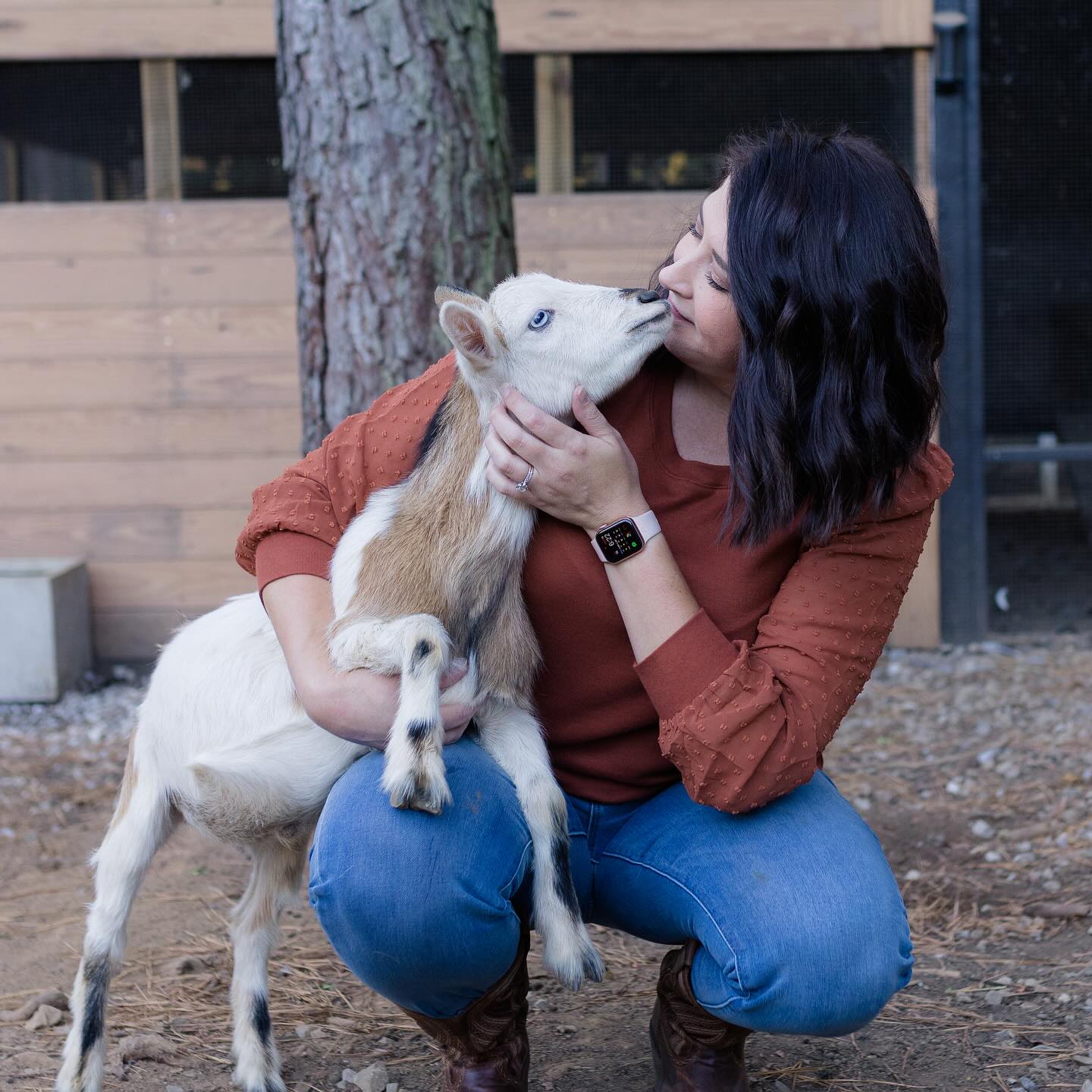 woman with a cute goat