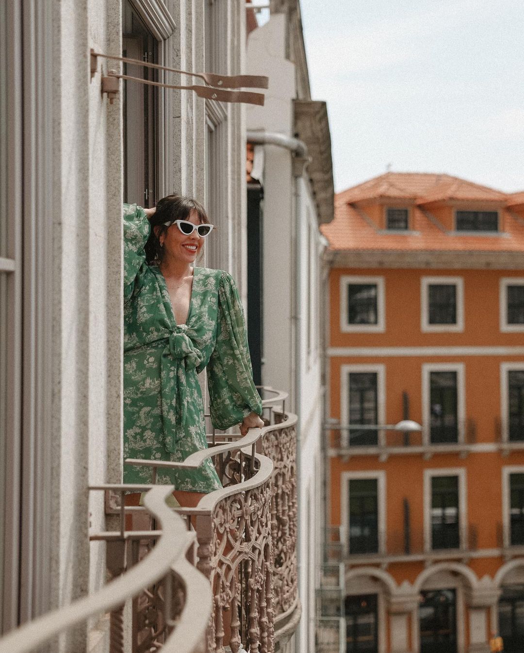 woman in europe on balcony