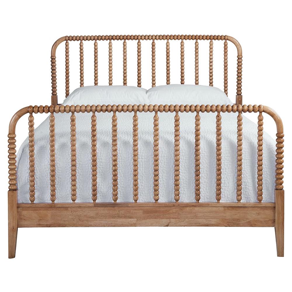 Brown wood spindle bed