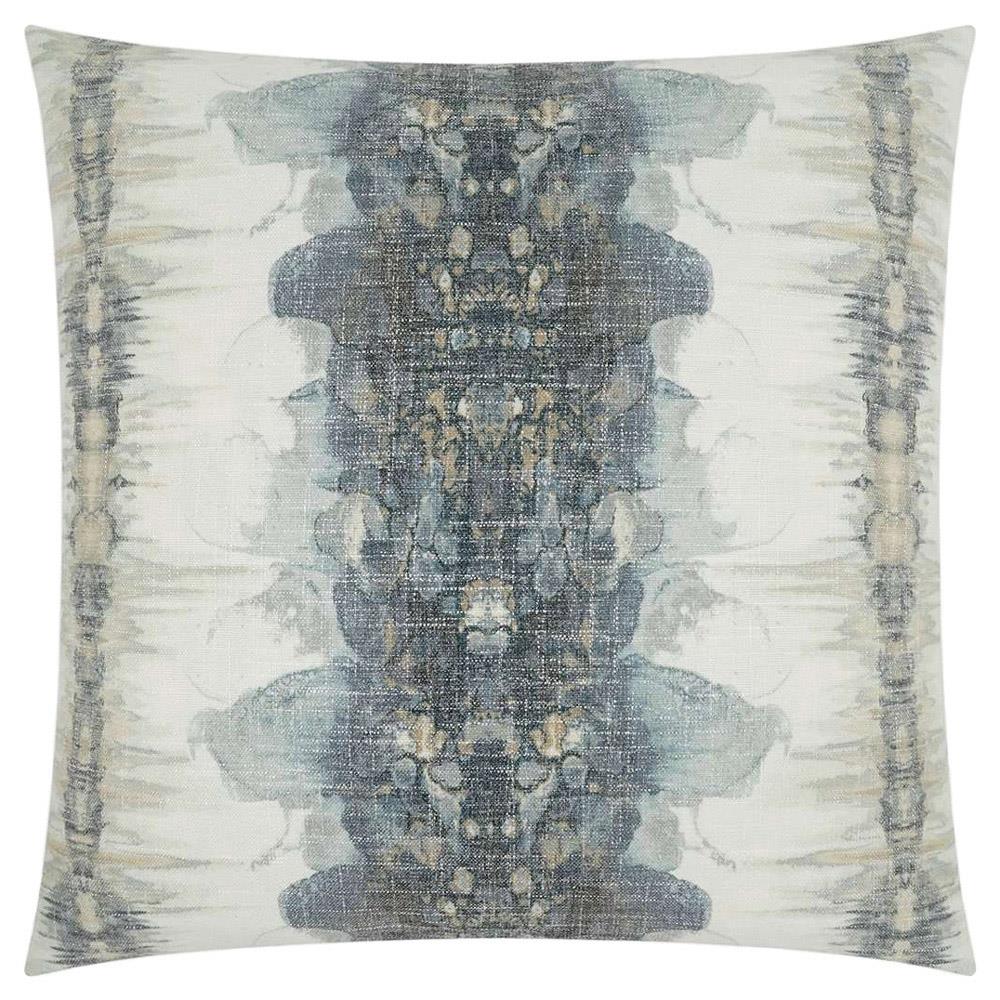 blue and cream patterned throw pillow