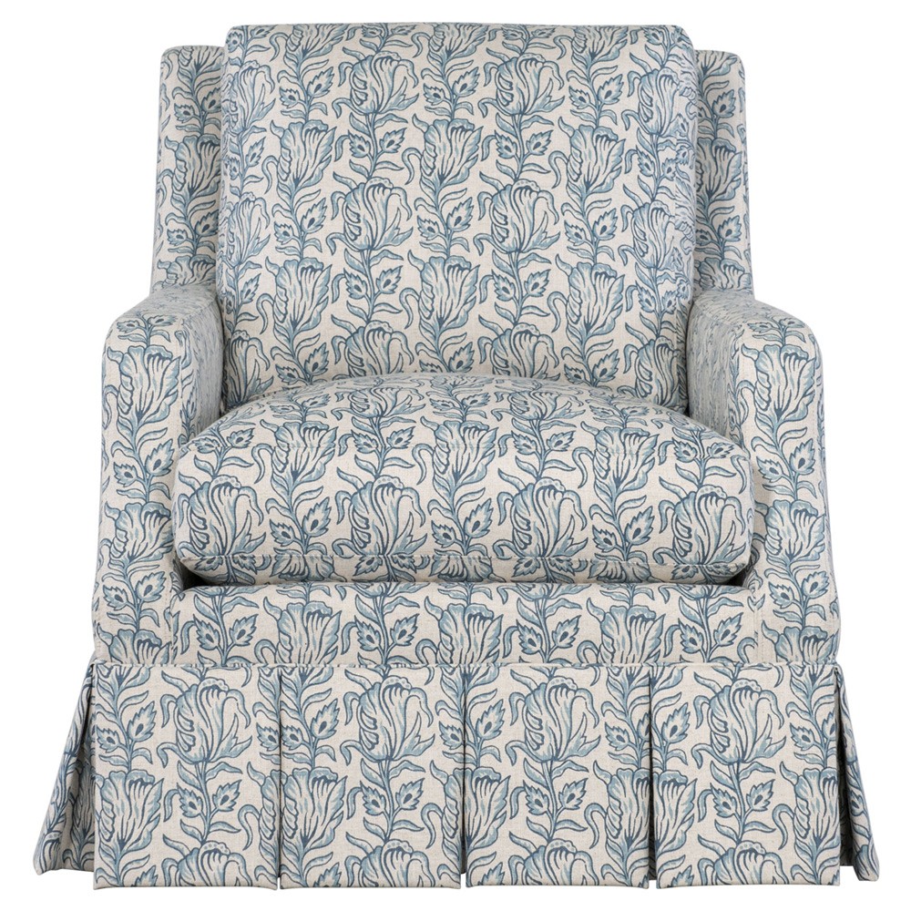 floral patterned blue armchair with pleated skirt