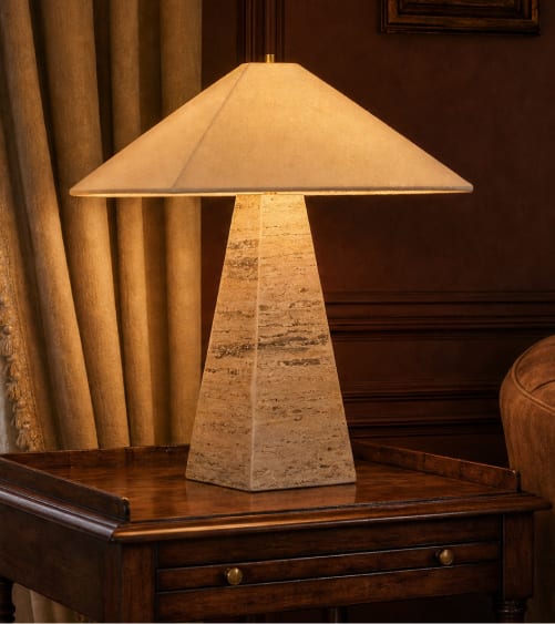Geometric stone table lamp casting warm light