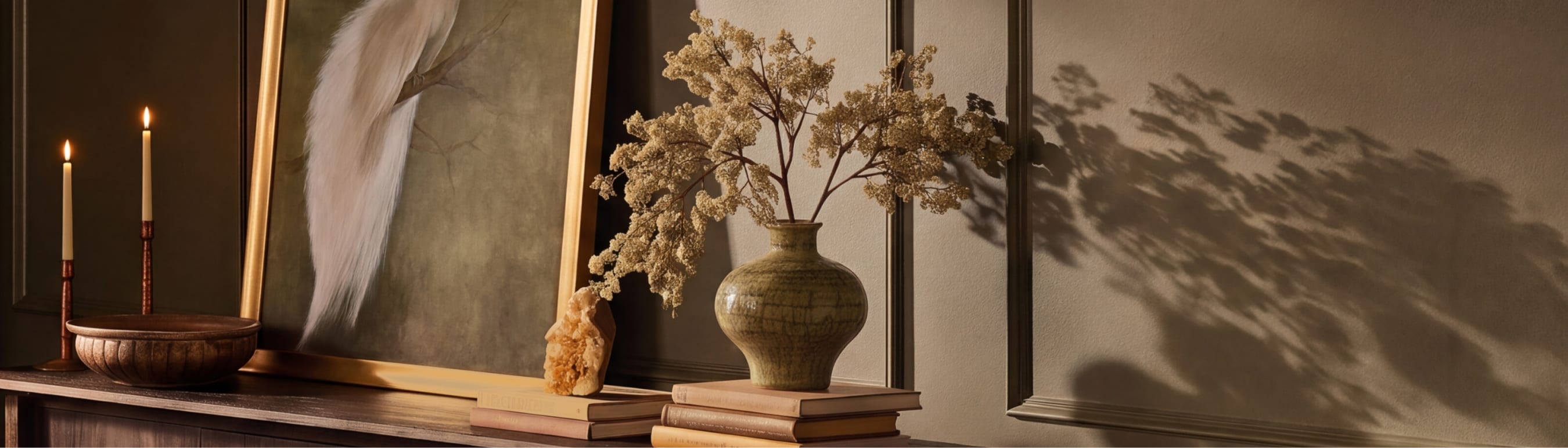 Dried fall floral arrangement in a stoneware vase