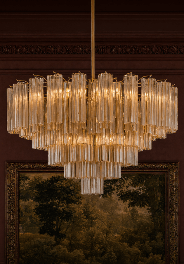Tiered glass-rod chandelier in a burgundy room